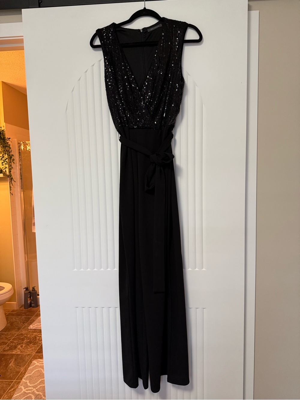 XXL sequins and black jumpsuit